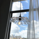 Petal glass pendant light hung by a window