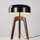 Walnut tripod lamp with black dome shade