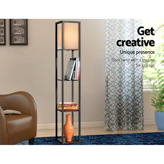 Three open display shelves under the fabric shade