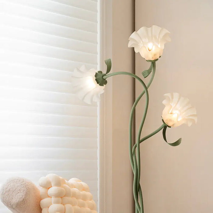 Cream flower shade floor lamp on green stems
