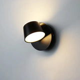 Battery wall sconce in black, 360 degree adjustable head