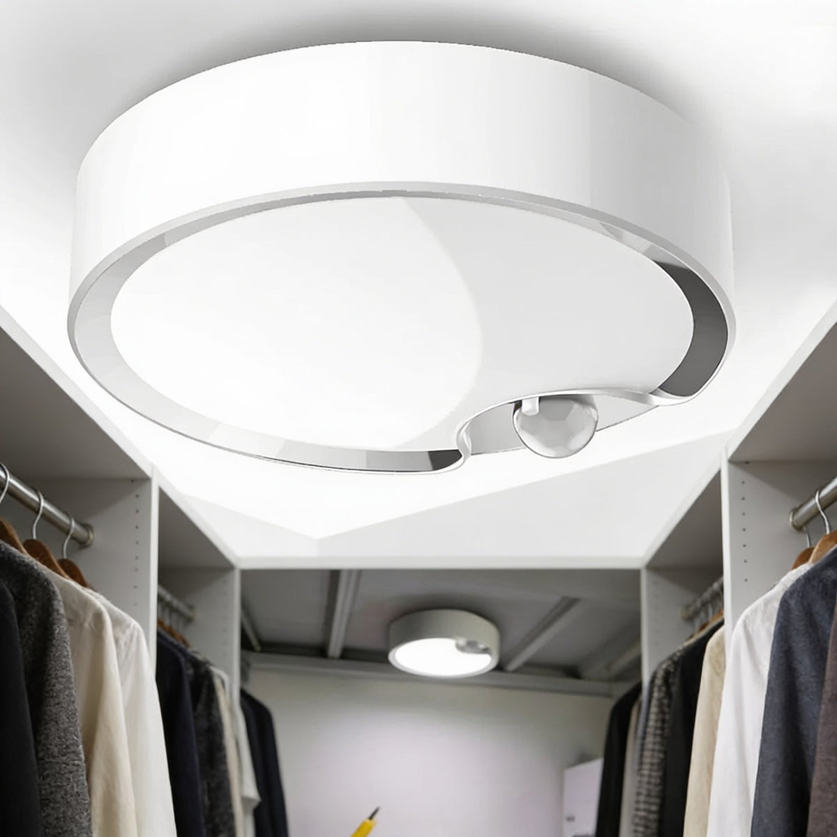 Motion sensor LED ceiling light lighting a walk-in wardrobe