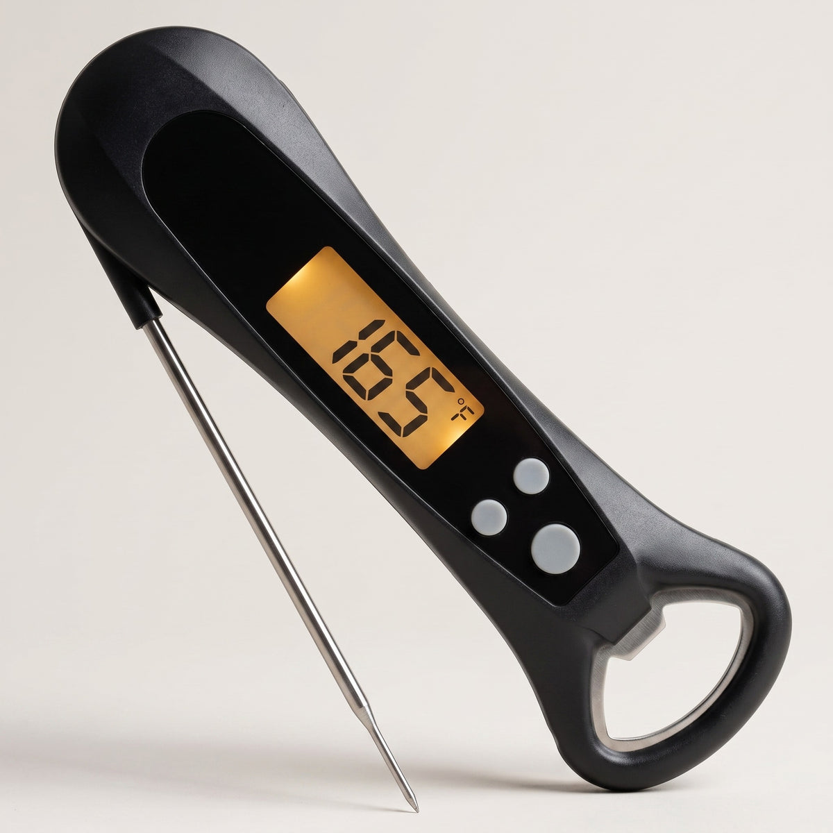 Digital food thermometer, folding probe open, amber display reading 165 degrees Fahrenheit, studio packshot