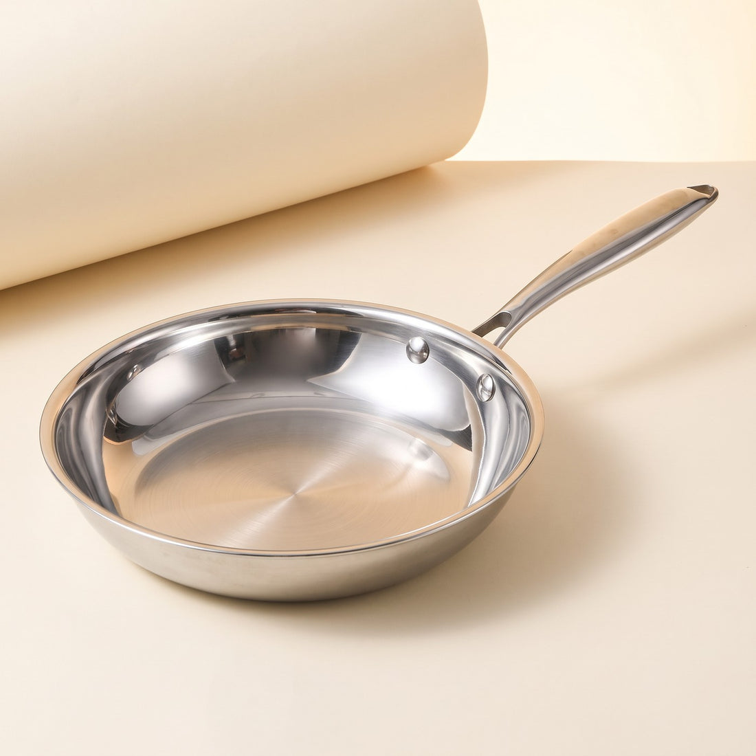 Stainless steel steak frying pan, three-quarter studio view