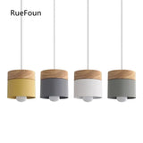 Wood cylinder pendant light in grey, yellow and white