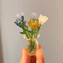 7 Pieces in Random ColorsWith Vase