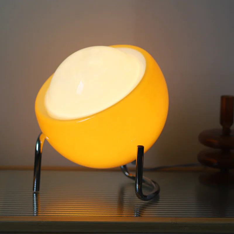 Handmade glass globe lamp glowing warm