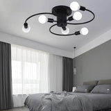Black and gold sputnik ceiling light over a living room