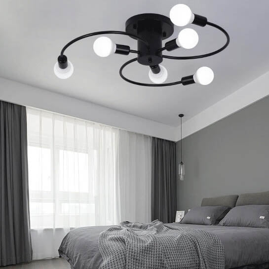 Black and gold sputnik ceiling light over a living room