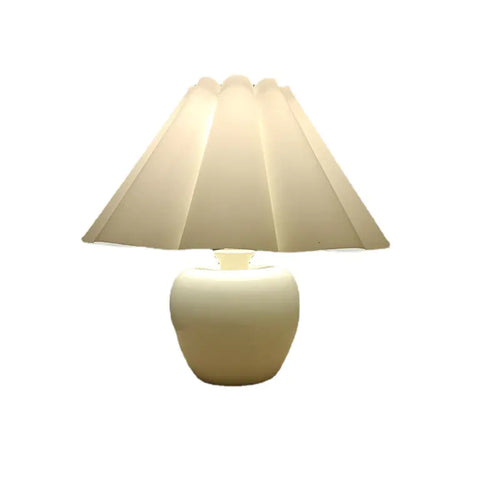 Nordic apple ceramic table lamp on a white background
