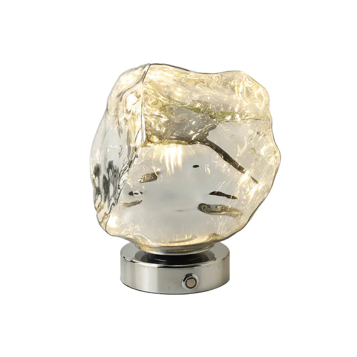 Lava rock glass table lamp on a white background