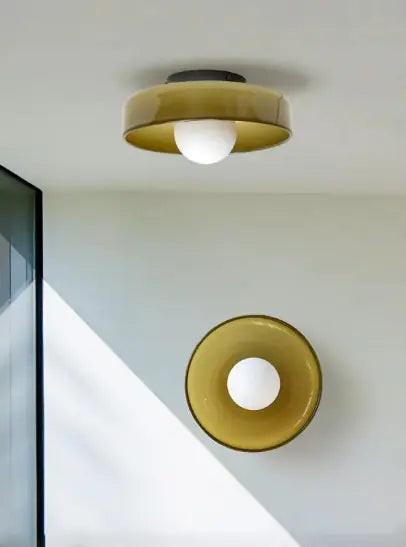Brass and amber glass flush mount ceiling light