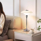 Nordic PH lamp on a bedside table