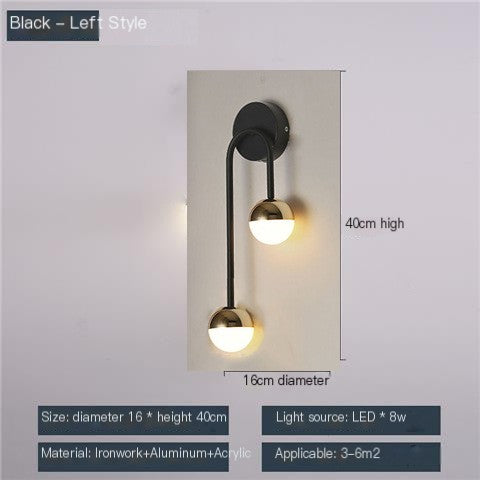 Ring and glass globe wall sconce on a white background