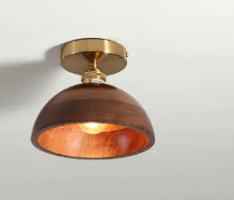 Walnut ceiling light in the round shape