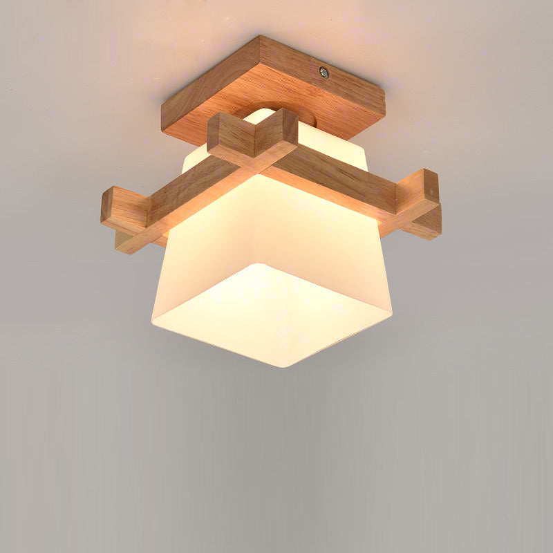 Nordic wood frame with frosted glass shade, seen from below