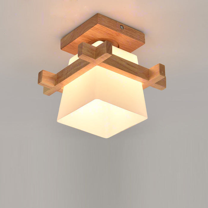 Nordic wood frame with frosted glass shade, seen from below