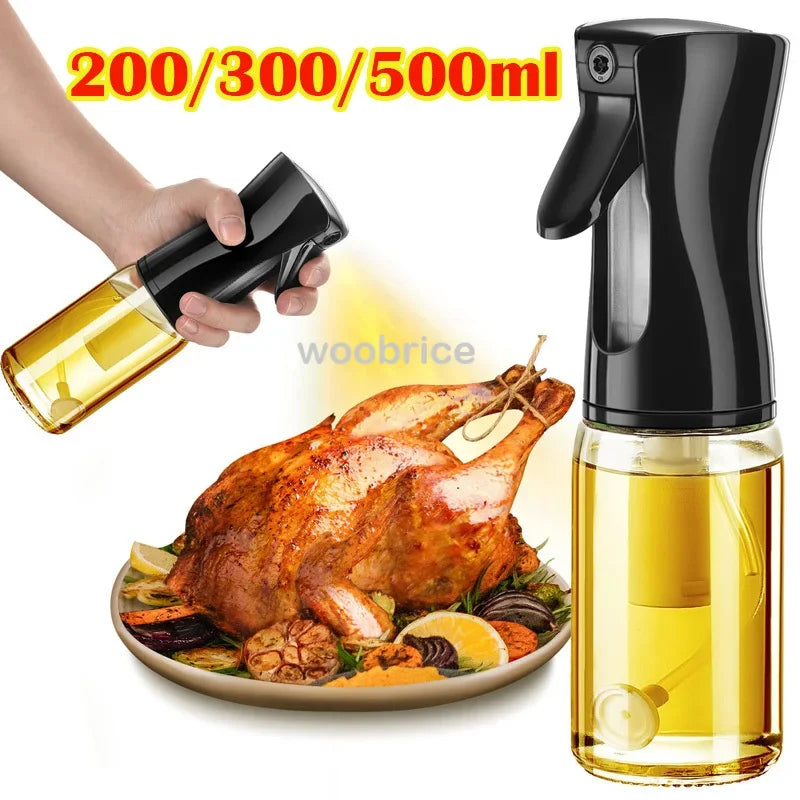 Glass olive oil sprayer misting roasted chicken