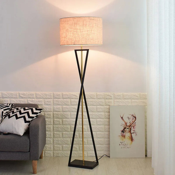 Drum shade floor lamp in a living room