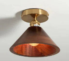 Walnut wood flush mount ceiling light, cone shade, lit
