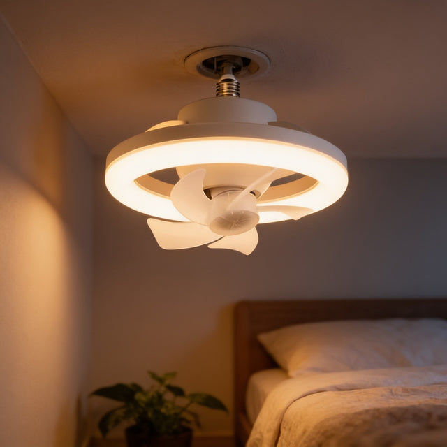 White E27 screw-in ceiling fan light fitted into a bedroom ceiling socket