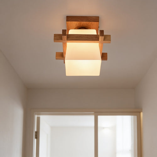 Nordic wood frame ceiling light with frosted glass shade in a bright hallway