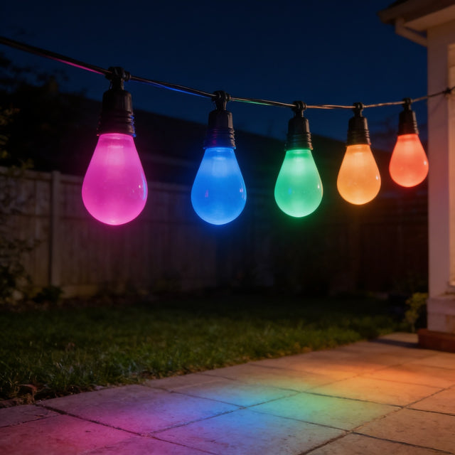 RGB colour-changing string lights glowing magenta, blue, green and orange over a patio