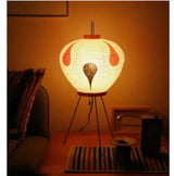 Rice paper lantern lamp glowing warm in a room