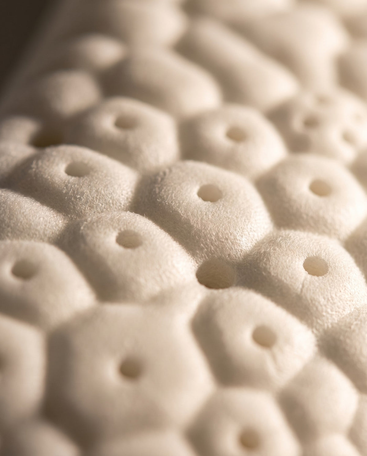 Close-up of the honeycomb cushioning pods and ventilation holes