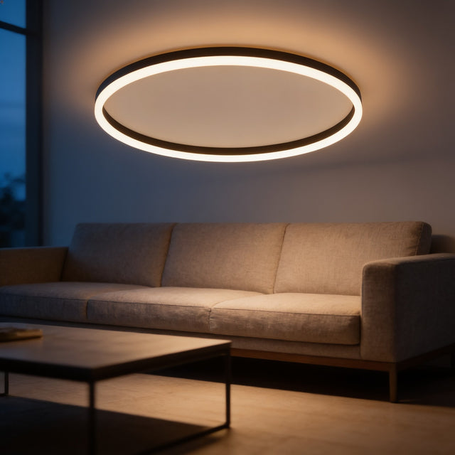 Ultra-thin black LED ring ceiling light glowing above a modern living room