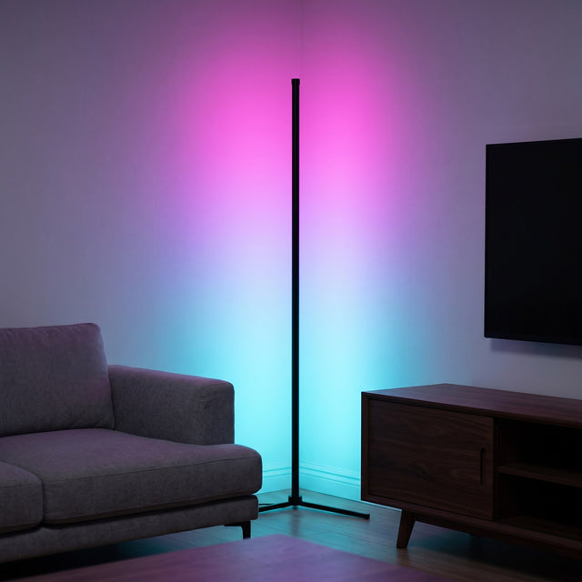 Slim RGB LED corner floor lamp glowing cyan and magenta in a modern living room corner