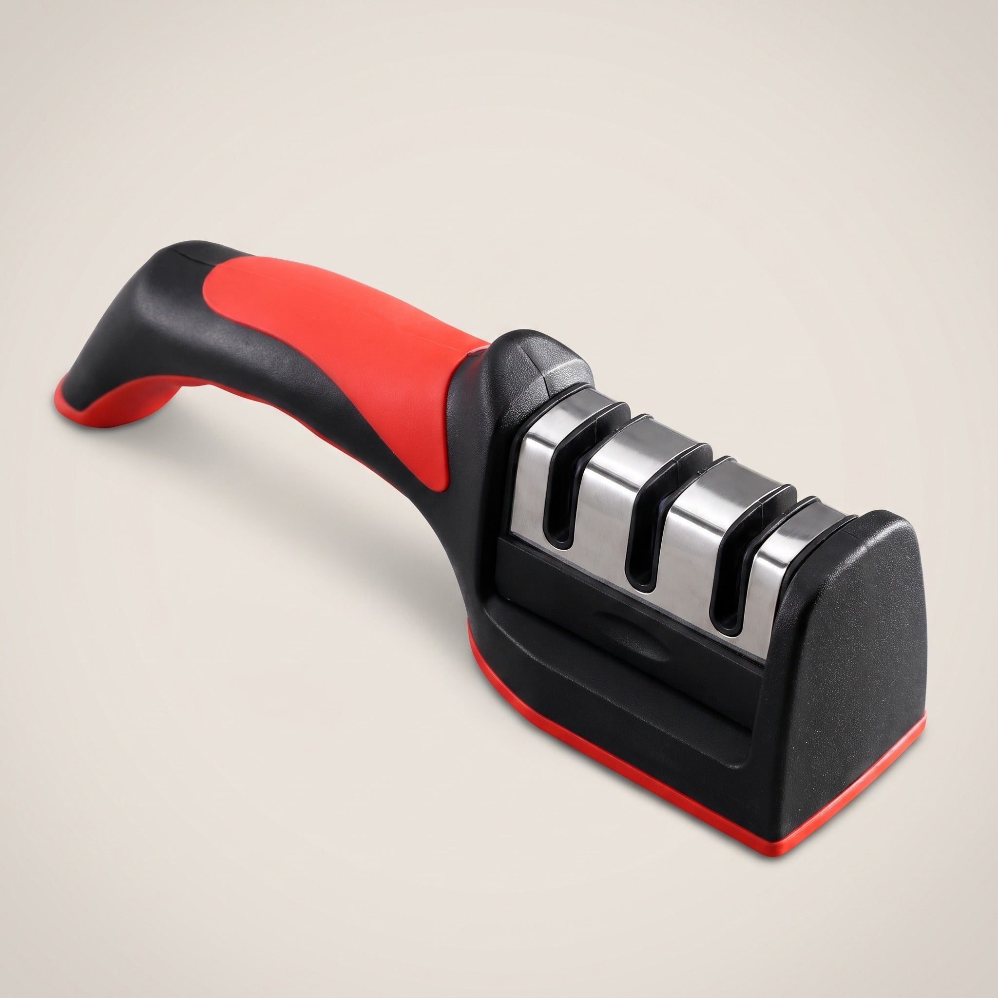 Handheld three-stage kitchen knife sharpener, black and red, studio packshot