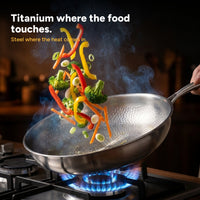 Vegetables tossed mid-air over a gas flame in the titanium pan