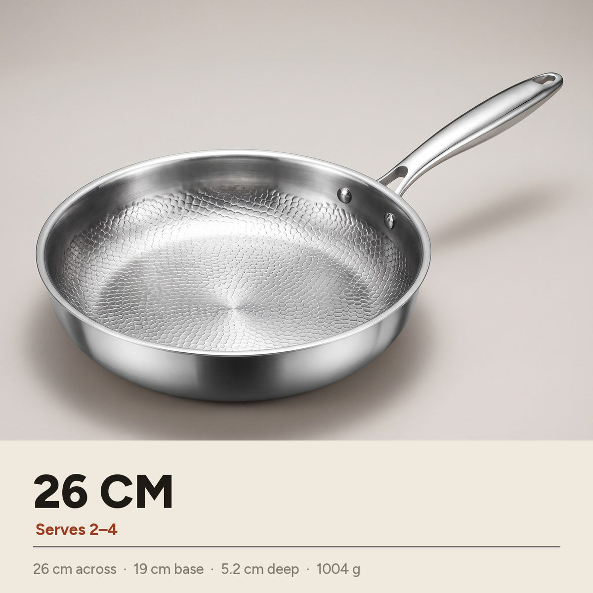 26cm titanium frying pan, no lid — 26 cm across, 19 cm base, 5.2 cm deep, 1004 g, serves 2 to 4