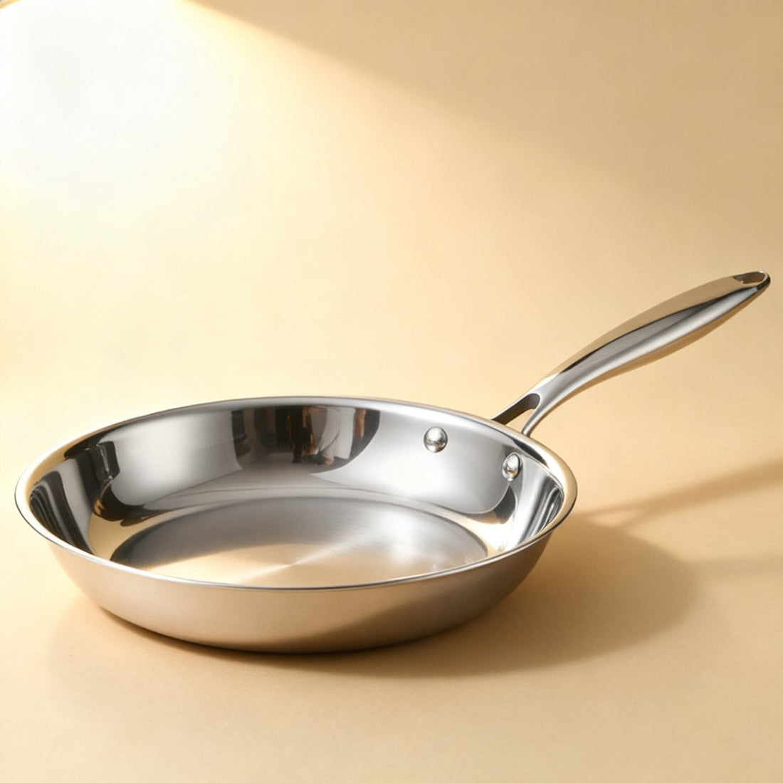 Side view of the stainless steel steak pan showing the thick base