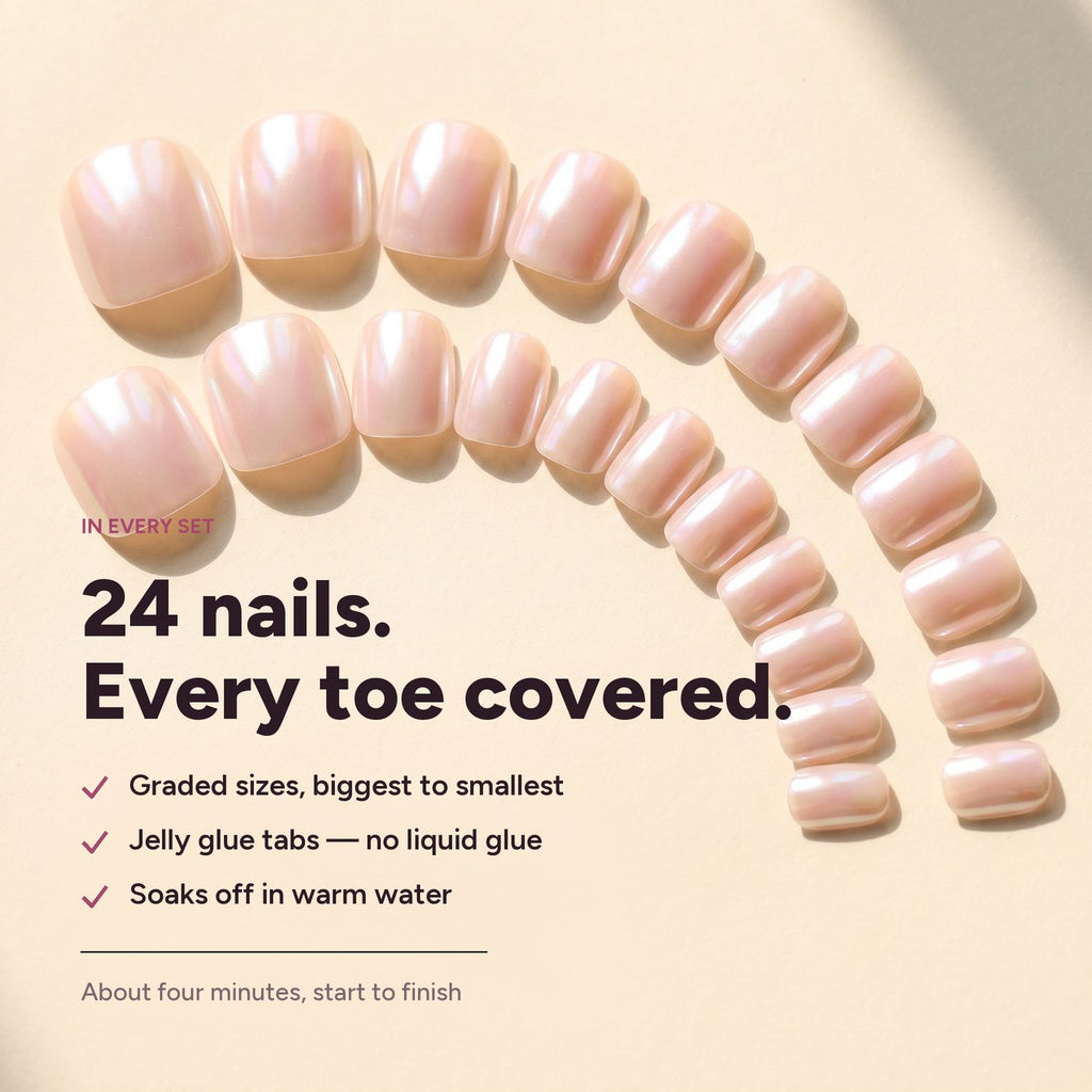 The 24 nails laid out in graded sizes, with the set contents listed